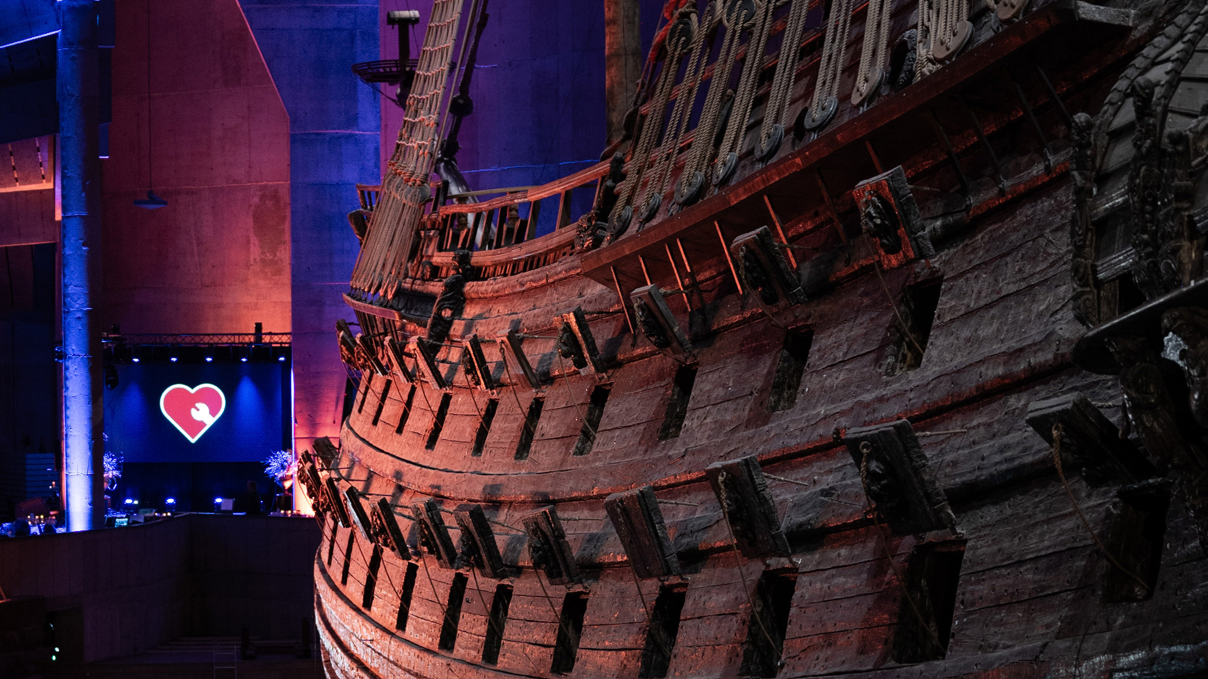 The warship Vasa beside the Support Vasa heart symbol